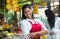 Happy mexican saleswoman on a farmers market