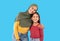 Happy Middle Eastern Mother Wearing Hijab Embracing Daughter, Blue Background
