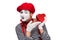 happy mime showing at heart shaped gift box