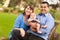 Happy Mixed Race Family Posing for A Portrait