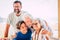 Happy mixed three generations family hug and enjoy together - people group portrait with seniod adult and teenager together -
