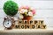 Happy Monday wooden letter alphabet with decorate item on wooden background