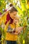 Happy mother and child exploring cornfield