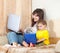 Happy mother and child with laptops