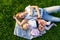 Happy Mother and daughter smiling at the park having picnic