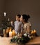 Happy mother and her child with christmas decoration. Hygge cozy home. Happy motherhood time