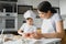 Happy mother and little son in the kitchen, happy time and togetherness