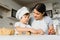 Happy mother and little son in the kitchen, happy time and togetherness