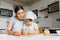 Happy mother and little son in the kitchen, happy time and togetherness