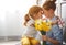 Happy mother`s day! child daughter gives mother a bouquet of f