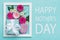 Happy Mother`s Day Pastel Candy Colours Background. Floral mothers day flat lay minimal concept with beautiful present.
