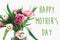 Happy Mother`s Day text sign on beautiful double peony tulips bouquet in vase in light. Stylish floral greeting card. Thank you,