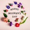 Happy Mothers Day letters with different spring flowers around them
