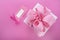 Happy Mothers Day white gift box with pink stripe ribbon.