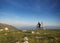 Happy mountainbike couple outdoors have fun together on a summer afternoon