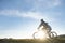 Happy mountainbike couple outdoors have fun together on a summer afternoon