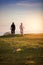 Happy mountainbike couple outdoors have fun together on a summer afternoon