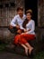 Happy multicultural couple. Romantic concept. Couple in love. Bamboo house. Caucasian wife and Balinese husband wearing