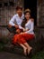 Happy multicultural couple. Romantic concept. Couple in love. Bamboo house. Caucasian wife and Balinese husband wearing