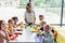 happy multiethnic schoolkids looking at camera