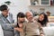 Happy multigenerational asian family portrait in living room