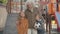 Happy multigenerational family posing at playground outdoors. Portrait of cheerful Caucasian senior man, little boy and
