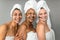 Happy multiracial senior women having skin care spa day