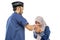 happy muslim daughter shake hand her father apologizing