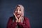 Happy Muslim Woman Smiling with Thinking Expression