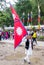 Happy Nepali Man with a big Nepali Flag