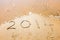 Happy New Year, 2014 written in sand