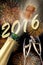 Happy new year 2016 with popping champagne