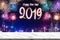 Happy new year 2019 fireworks over cityscape at night with empty white marlbe table,Banner mock up template for display or montage