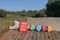 Happy New Year 2019 with multi colored stones on a hay roll with country background