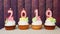 Happy new year 2019, number candles on cupcakes with wooden background