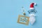 Happy New year 2021 background. Creative Santa with hat, beard and glasses decorated with holiday decorations. Flat lay