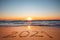 Happy New Year 2021 concept, lettering on the beach. Written text on the sea beach at sunrise