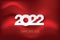 Happy new year 2022. White paper numbers on red background.