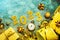 Happy new year 2023. Top view of golden Numbers 2023 with christmas ornament and antique clock. New Years eve celebration concept