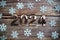 Happy new year 2024 holidays celebration with snowflakes decoration on wooden background