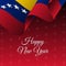 Happy New Year banner. Venezuela waving flag. Snowflakes background.