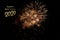 Happy New Year Celebration Text with Festive Gold Fireworks Collage in Night Sky