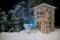 Happy New Year Celebration, Young Family of Three Standing in the Front Yard Looking into the Sky In the EveningÑŽ House Decorated