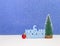 Happy New Year congratulation in Russian language with christmas tree on blue background