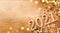 Happy New Year festive background with golden numbers 2021 and Christmas decorations on vintage wooden table top view