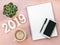 Happy New Year\'s FLAT LAY 2019 notepad, free space for text. Christmas decorations. Goals for the new year. mockup phone