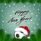 Happy New year. Soccer ball in a santa hat