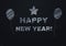 Happy new year! written black chalk table with baloon shapes and