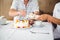 Happy nurse serving a dessert to his patient