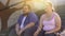 Happy obese man and woman sitting on stairs and smiling, friendship, date